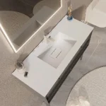 Granite bathroom sink in white color and 120 cm length mounted on bathroom cabinet